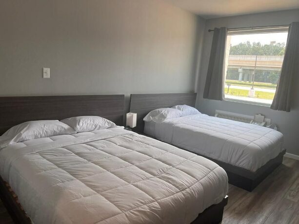 Imagen de la habitación del Hotel Champion Inn. Foto 7