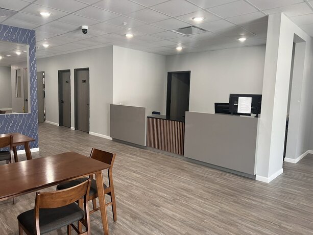 Imagen de los interiores del Hotel Champion Inn Motel By OYO Hwy 59 Shepherd. Foto 7