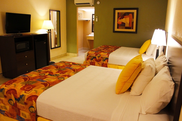 Imagen de la habitación del Hotel Champions World Resort. Foto 9