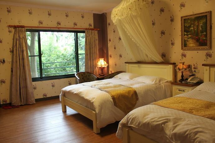 Imagen de la habitación del Hotel Champs Yazuh Bandb. Foto 31