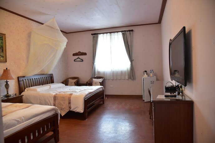 Imagen de la habitación del Hotel Champs Yazuh Bandb. Foto 36