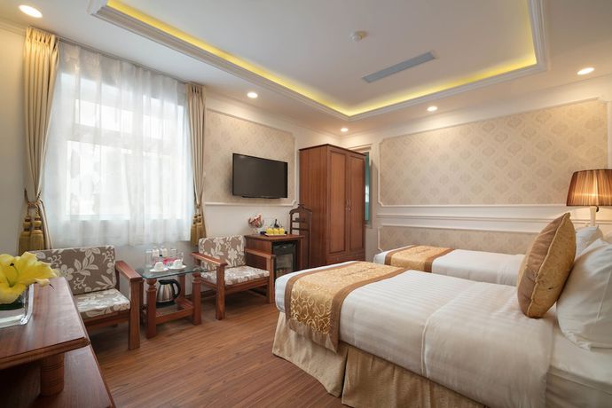 Imagen de la habitación del Hotel Champton Hanoi. Foto 17