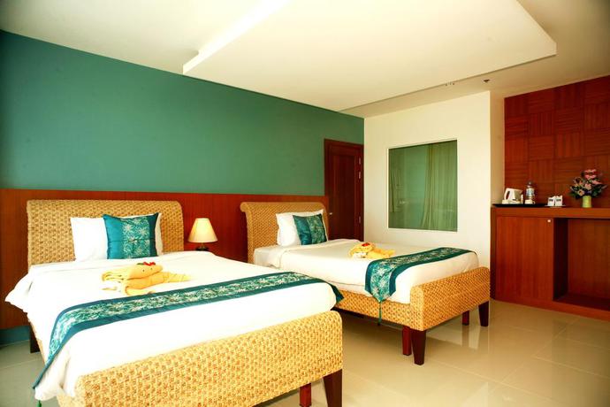 Imagen de la habitación del Hotel Chanalai Flora Resort, Kata Beach. Foto 7
