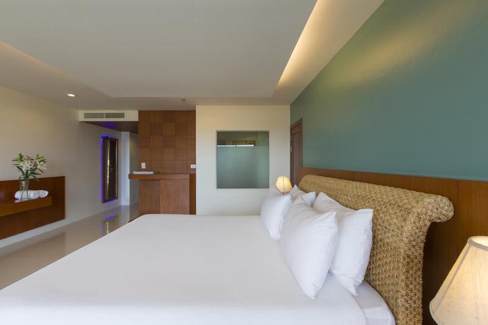 Imagen de la habitación del Hotel Chanalai Flora Resort, Kata Beach. Foto 10