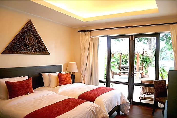 Imagen de la habitación del Hotel Chandara Resort and Spa Phuket. Foto 10