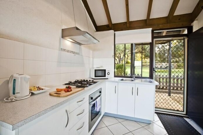Imagen de la habitación del Hotel Chandlers Smiths Beach Villas. Foto 28