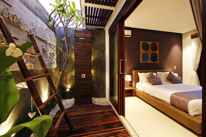 Imagen de la habitación del Hotel Chandra Bali Villas. Foto 14