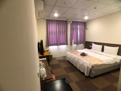 Imagen de la habitación del Hotel Chang Ti Metropolis Commercial. Foto 7