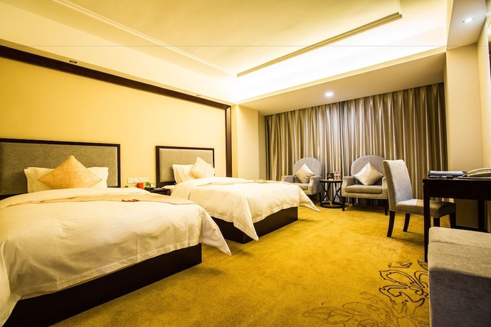 Imagen de la habitación del Hotel Changchun Huatian. Foto 8