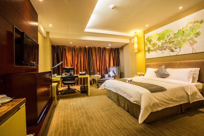 Imagen de la habitación del Hotel Changchun Huatian. Foto 12