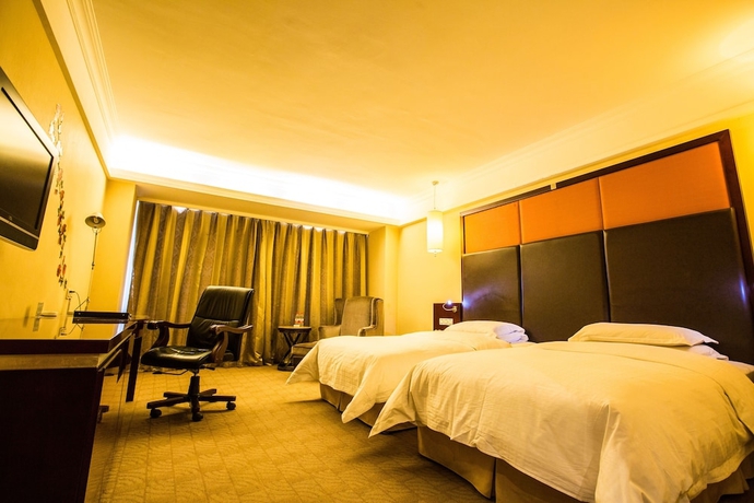 Imagen de la habitación del Hotel Changchun Huatian. Foto 13