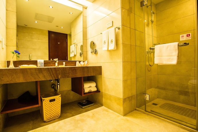 Imagen de la habitación del Hotel Changchun Huatian. Foto 14