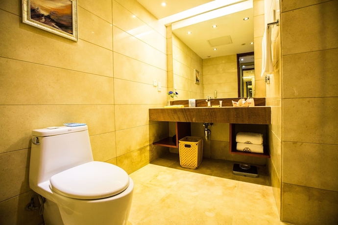 Imagen de la habitación del Hotel Changchun Huatian. Foto 15