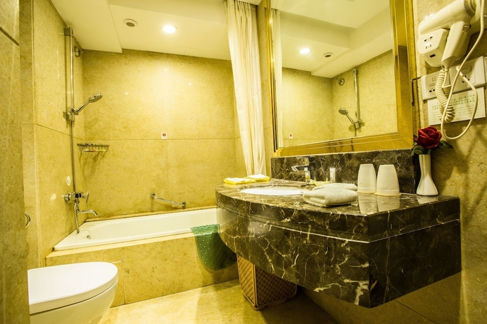 Imagen de la habitación del Hotel Changchun Huatian. Foto 16