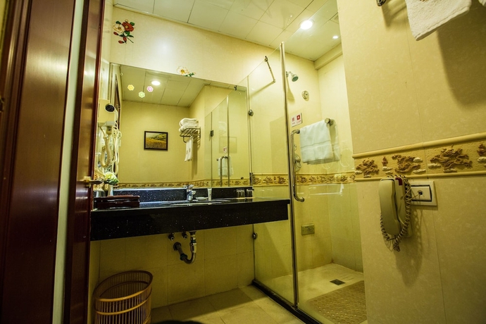Imagen de la habitación del Hotel Changchun Huatian. Foto 17