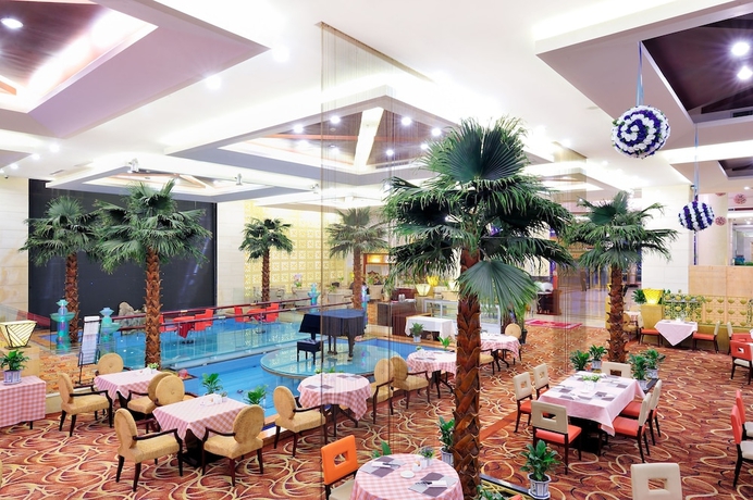 Imagen del bar/restaurante del Hotel Changchun Huatian. Foto 7