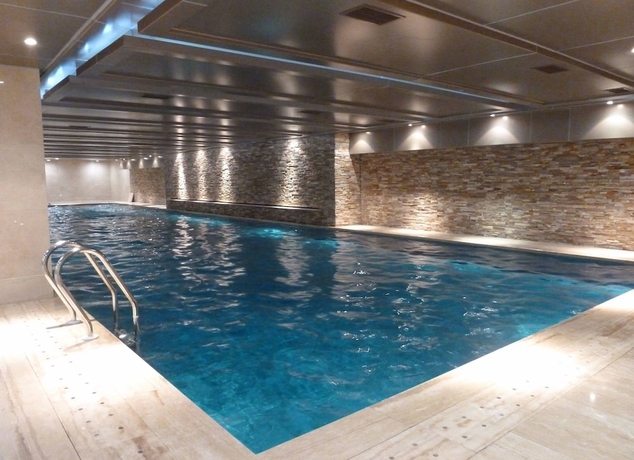 Imagen de la piscina del Hotel Changchun Ramada. Foto 19