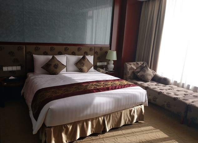 Imagen de la habitación del Hotel Changchun Ramada. Foto 8