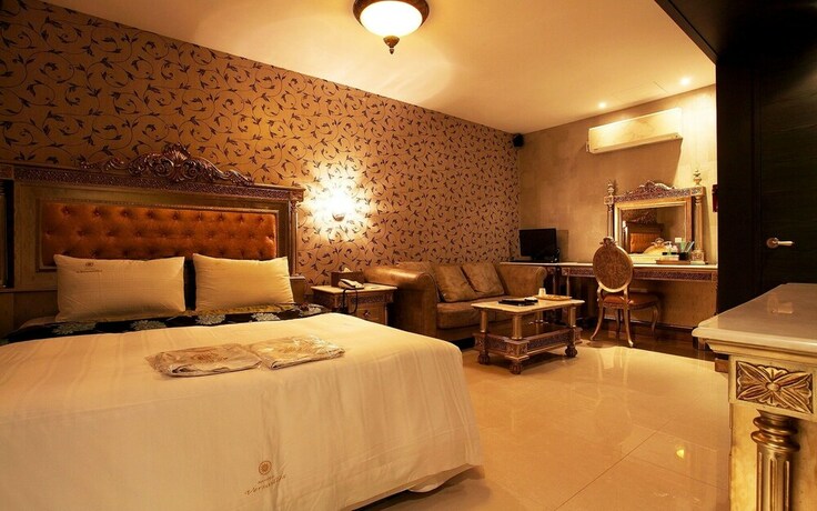 Imagen de la habitación del Hotel Changdong Versaille. Foto 17