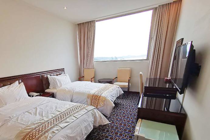 Imagen de la habitación del Hotel Changhong. Foto 4