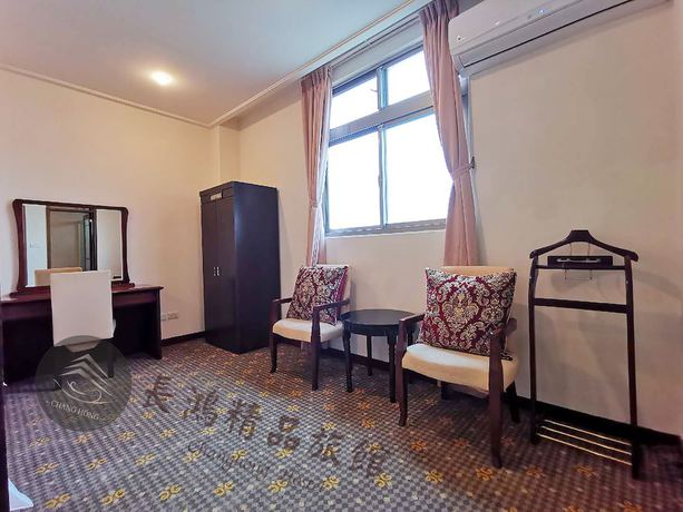 Imagen de la habitación del Hotel Changhong. Foto 5