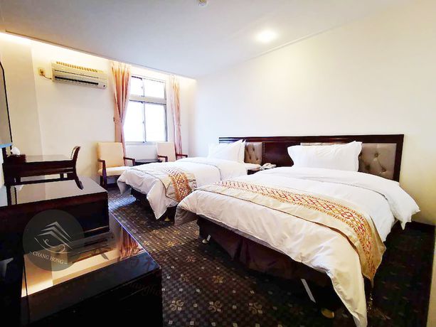 Imagen de la habitación del Hotel Changhong. Foto 7