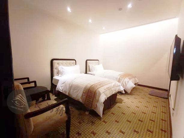 Imagen de la habitación del Hotel Changhong. Foto 10