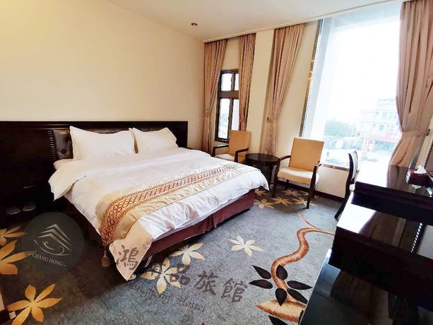 Imagen de la habitación del Hotel Changhong. Foto 11