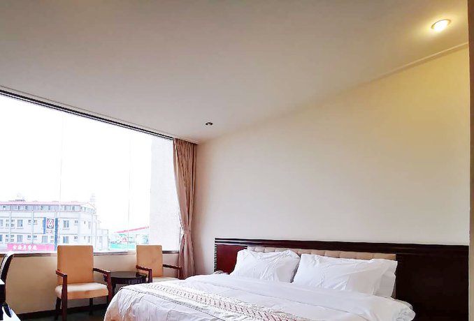 Imagen de la habitación del Hotel Changhong. Foto 14