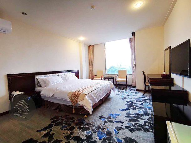 Imagen de la habitación del Hotel Changhong. Foto 15
