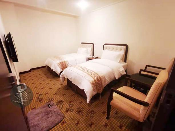 Imagen de la habitación del Hotel Changhong. Foto 17