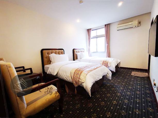Imagen de la habitación del Hotel Changhong. Foto 18