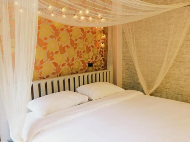 Imagen de la habitación del Hotel Changpuak. Foto 4