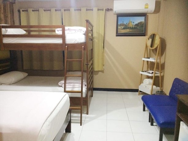 Imagen de la habitación del Hotel Changpuak. Foto 11