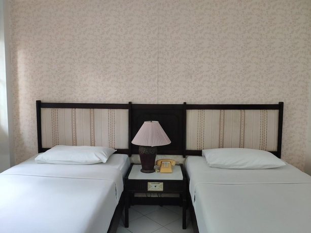 Imagen de la habitación del Hotel Changpuak. Foto 12