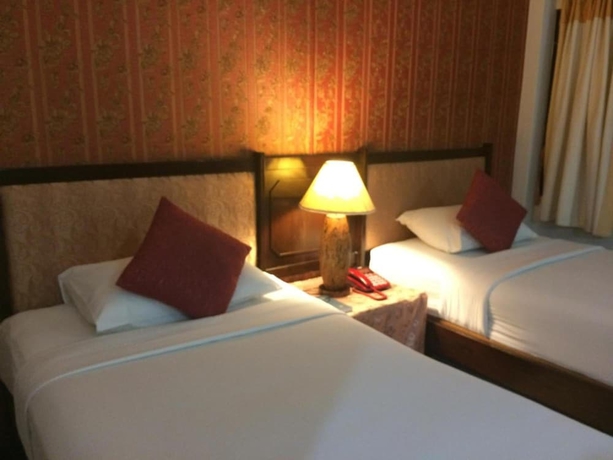 Imagen de la habitación del Hotel Changpuak. Foto 14