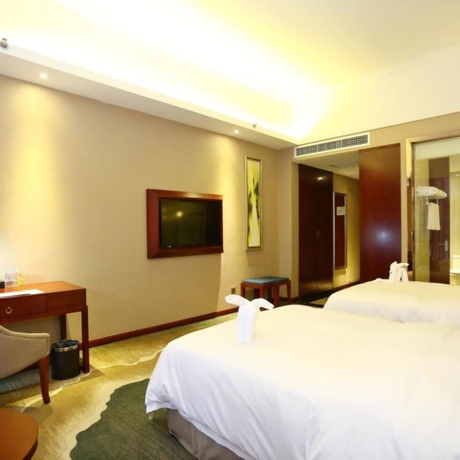 Imagen de la habitación del Hotel Changsha Jiaxing Inn. Foto 4