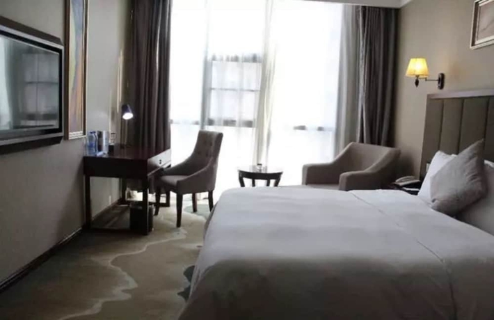Imagen de la habitación del Hotel Changsha Jiaxing Inn. Foto 10