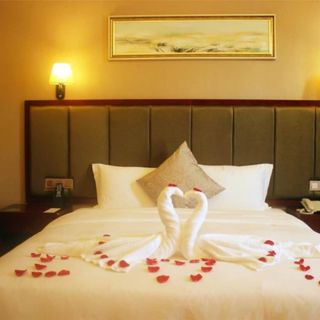 Imagen de la habitación del Hotel Changsha Jiaxing Inn. Foto 12