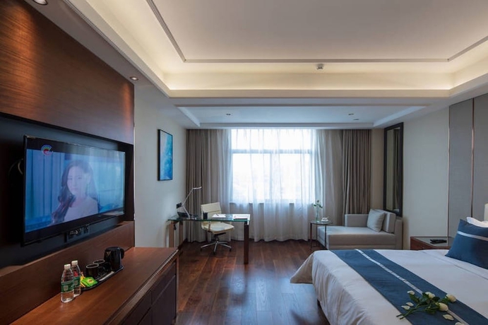 Imagen de la habitación del Hotel Changshu Skyline Cloud. Foto 3