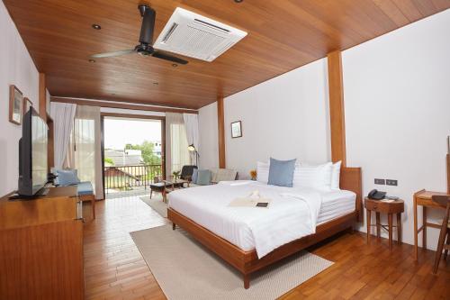 Imagen de la habitación del Hotel Chann Bangkok Noi. Foto 2