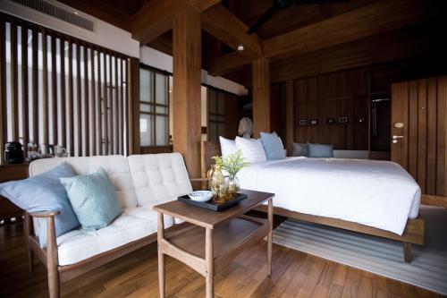 Imagen de la habitación del Hotel Chann Bangkok Noi. Foto 3