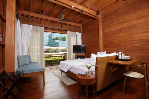Imagen de la habitación del Hotel Chann Bangkok Noi. Foto 4