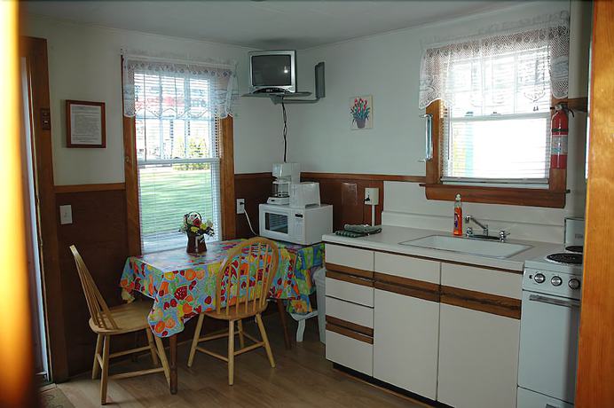 Imagen de la habitación del Hotel Channel Watefront Cottages. Foto 11