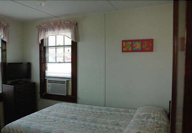 Imagen de la habitación del Hotel Channel Watefront Cottages. Foto 17