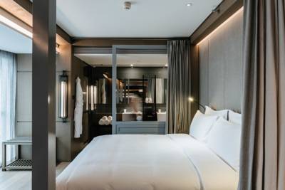 Imagen de la habitación del Hotel Chao Sanlitun Beijing. Foto 3