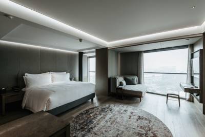 Imagen de la habitación del Hotel Chao Sanlitun Beijing. Foto 5