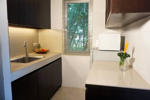 Imagen de la habitación del Hotel Chaofa West Suites. Foto 5