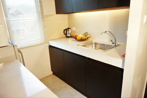 Imagen de la habitación del Hotel Chaofa West Suites. Foto 9