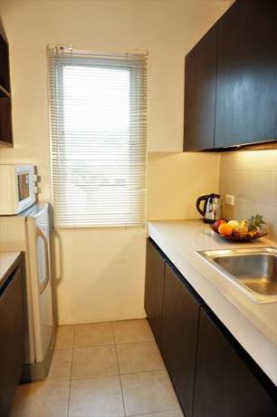 Imagen de la habitación del Hotel Chaofa West Suites. Foto 11
